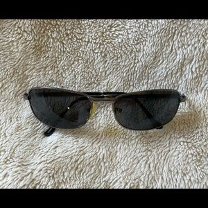 Classic style black sunglasses with a tint of blue! Great with all outfits!